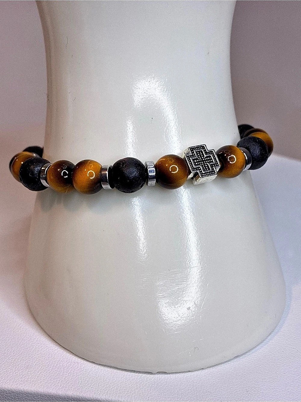 Tiger's Eye & Black Lava Stone Beads, Accented With A Decorative Metal Cross Cha